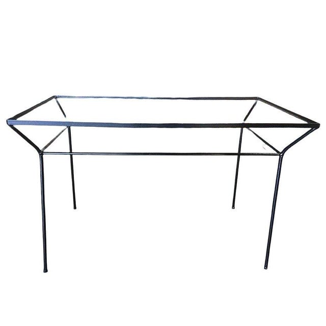 Rare Art Deco era black iron outdoor dining table featuring a geometric design and petite frame. Dimensions Height: 29" X...