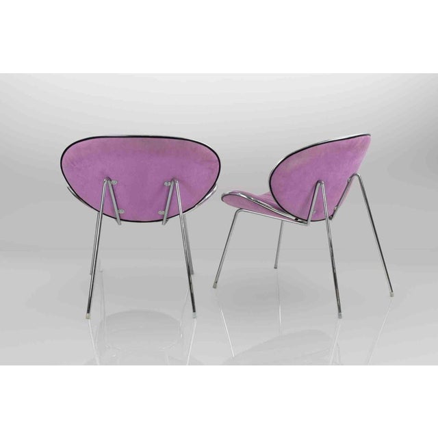 Vintage Chairs Italian Production 1980s. Seat covered in white microfibre. Structure made of chromed metal.