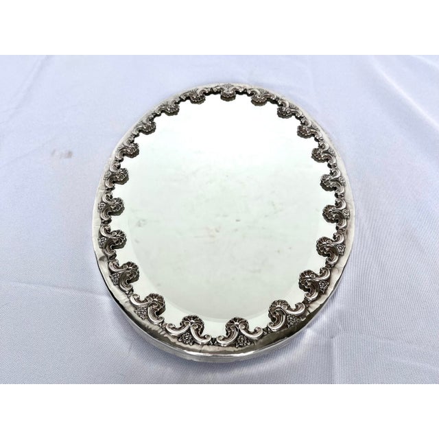 Elevate your tablescape or vanity with this exquisite vintage mirrored plateau tray, expertly crafted in Portugal by the...