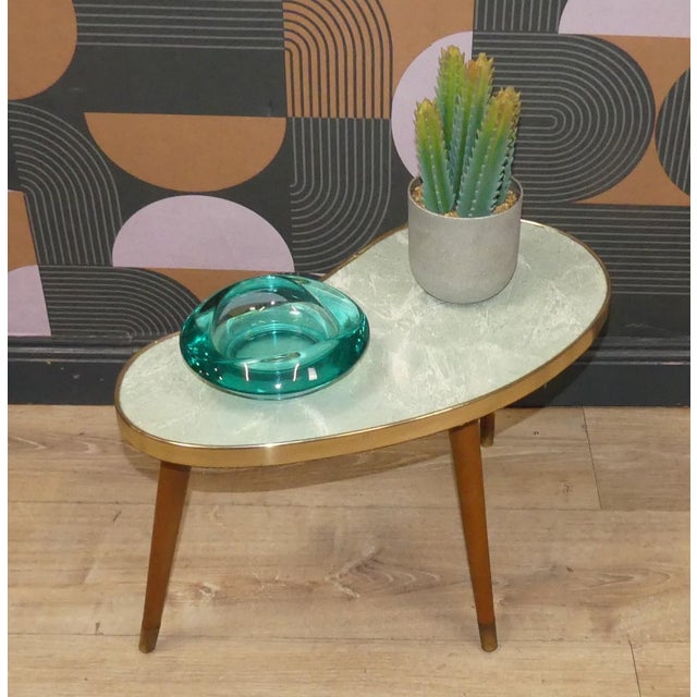 Cool decorative piece! Stylish little side table in excellent condition 1950s/60s particularly beautiful shape a true...