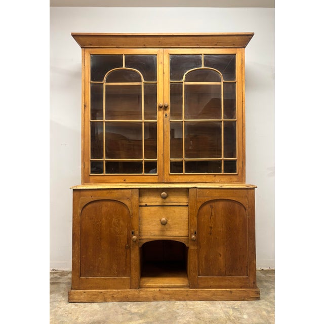 A rare and character-rich Georgian era English pine dresser/bookcase, this piece is a wonderful example of honest country...