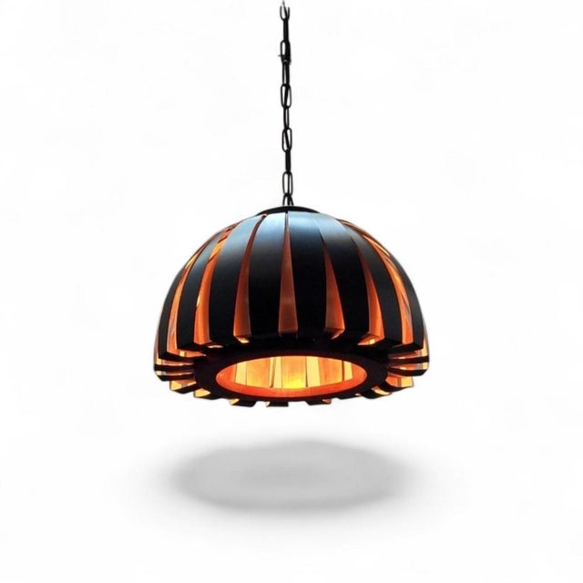 The Fiesta pendant. Wonderful pendant constructed with internal copper slats and with external contrasting slats in black...