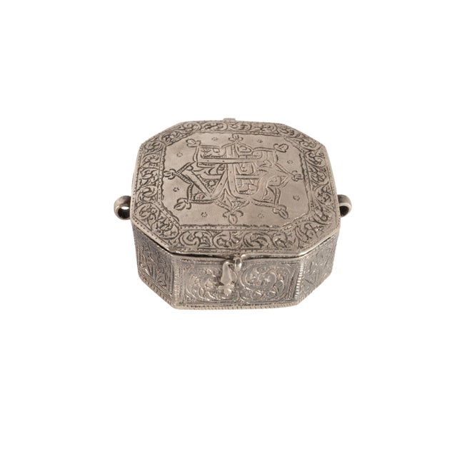 A good antique early 19th century Persian silver engraved Holy Qur'an case amulet, circa 1820. This type of Qur'an case is...
