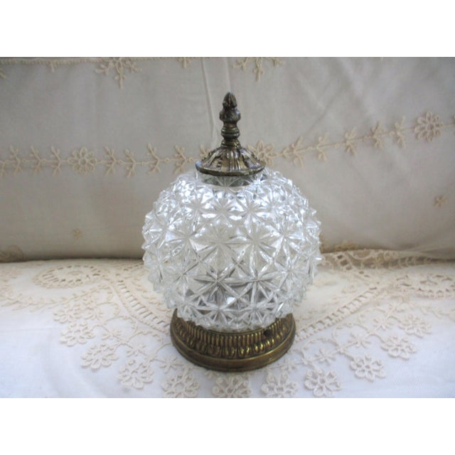 This is a Vintage Hollywood Regency Diamond Cut Crystal Flush Mount Ceiling Light marked Underwriters Laboratories, Inc....