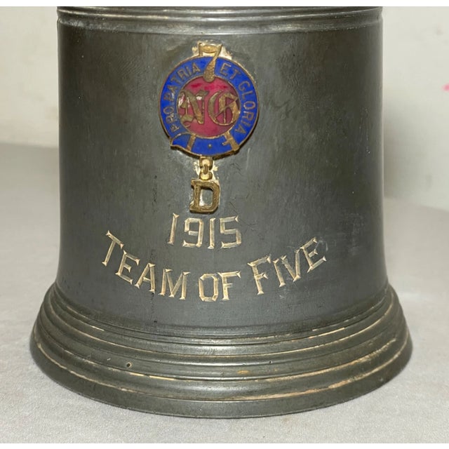 Experience a piece of history with this Antique 1915 World War 1 7th Regiment, New York National Guard lidded stein award...