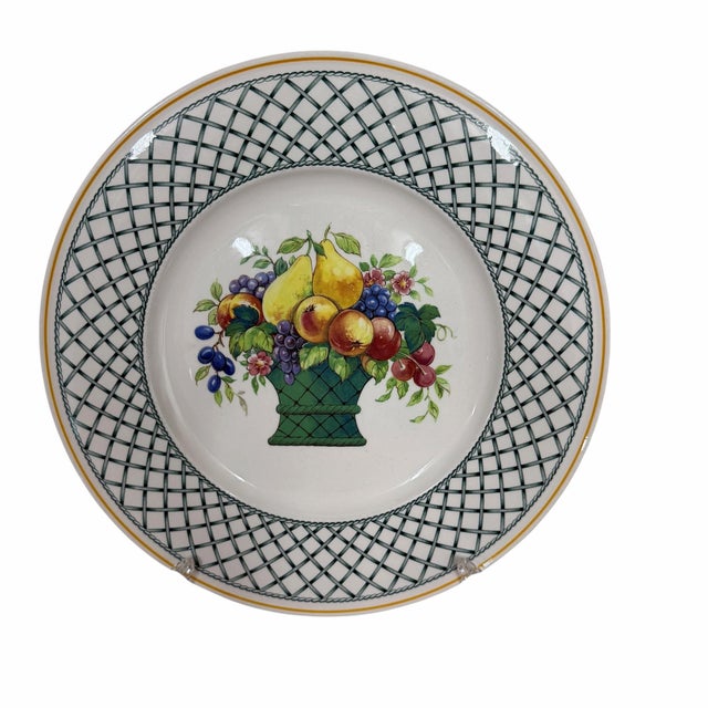 Set of thirteen vintage 1990s Villeroy & Boch Basket pattern dinner plates. Each measures 10.5” diameter. No chips, cracks...