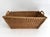 Traditional 1960s woven wicker French market basket with braided handles Two wood supports on the bottom extend the length...