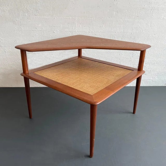 This 1960s Danish Modern two-tier corner side table was designed by Peter Hvidt & Orla Mølgaard-Nielsen and manufactured...