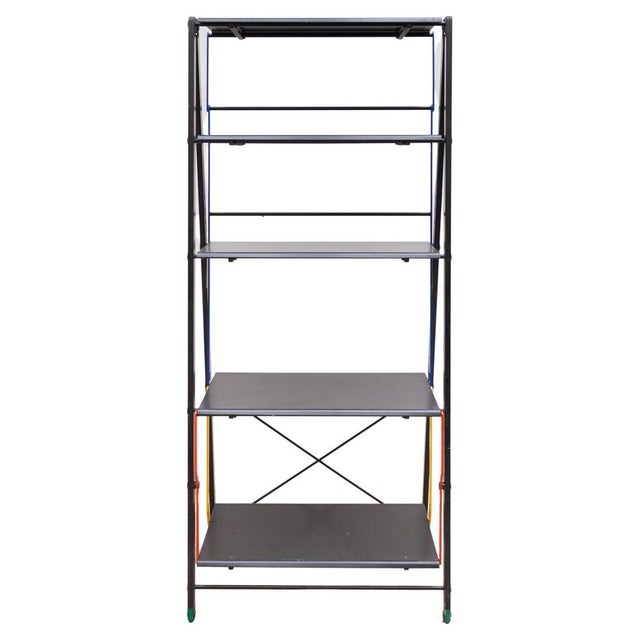 Very typical rare eighties Italian designed book shelf with five shelves which one shelve can also move to pull forward to...