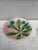 Majolica chestnut leaves plate Salins, circa 1880, on a pink background.