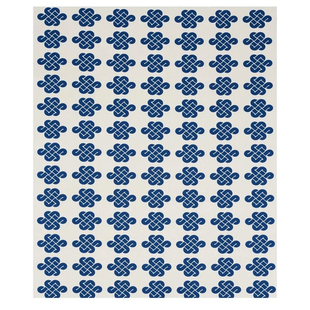 Glamorous, graphic, and preppy, Penelope Knot is a statement-making fabric featuring a Chinese good-luck knot from a...