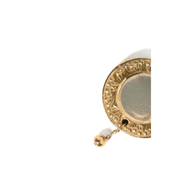 Glazed ceramic miroir de poche with crackled gold ceramic adornments. The mirror was created by French ceramicist Francois...