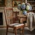 Made by Dixie Dinettes, Inc. of Richmond, Virginia, this 1970s Colonial Revival side chair reflects the Early American...