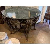 This exquisite French round center table is a masterful combination of wrought iron and Verde Marble, embodying the fluid...