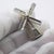 A windmill miniature crafted in Italy during the 1980s or 1990s. The piece is hallmarked 800 which stands for Continental...