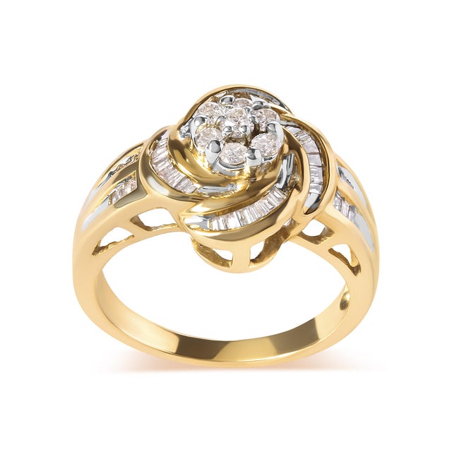 Indulge in the timeless beauty of this 10K yellow gold flower swirl cocktail ring, adorned with 43 natural diamonds...