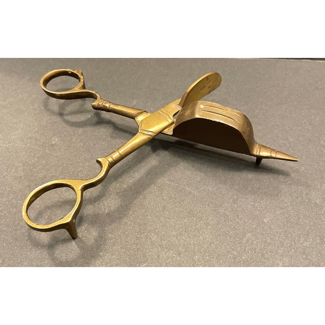 Vintage brass candlewick scissor form snuffers. They trim the wick and snuff the flame. Unmarked. Combined shipping...