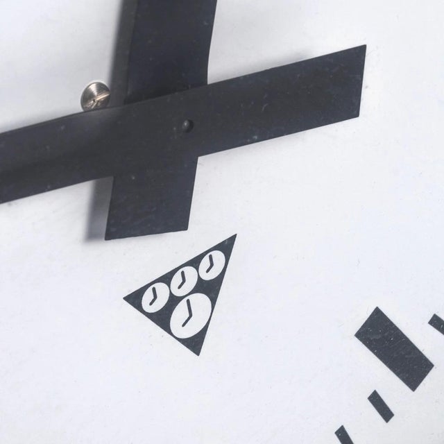 Original industrial wall clock Pragotron type C 301 produced in 1980s. Clock is equipped with a rather minimalist clock...