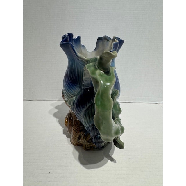 If you love the sea, then you will appreciate this vintage Pitcher of a Conch Shell, sea star, clam and coral. I love the...