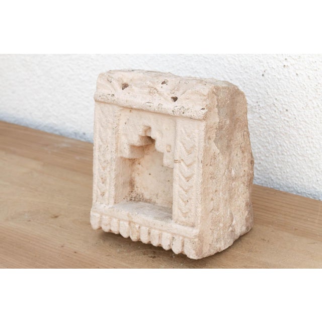 Carved from solid stone, this antique wall niche—traditionally known as a Gokha—was originally embedded into the masonry...