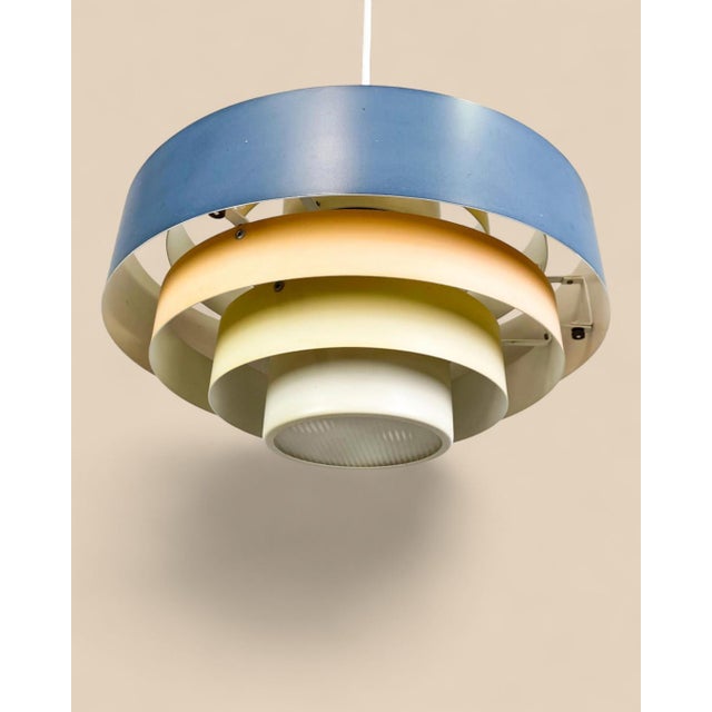 Danish “Ultra” pendant lamp designed by Jo Hammerborg for the renowned manufacturer Fog & Mørup in the 1960s. This model...