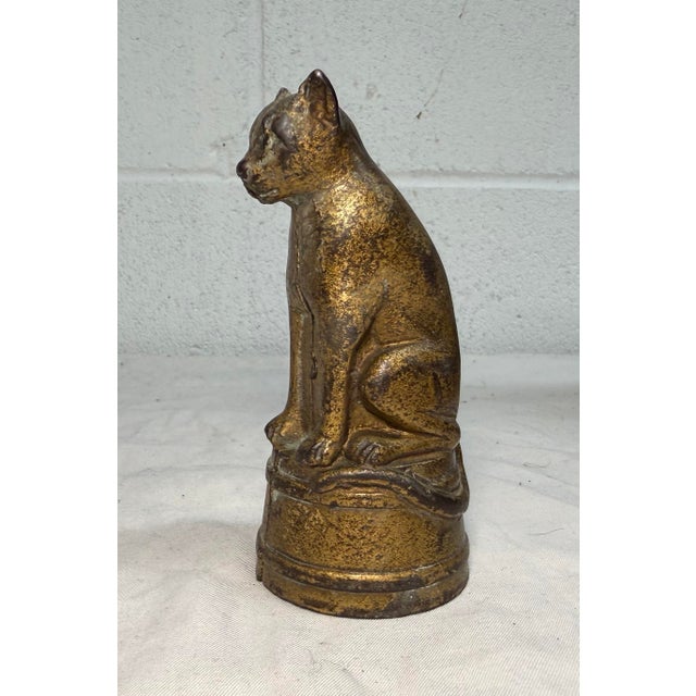 Up for sale is an antique early 1900's AC Williams hand-painted cast iron circus cat still bank. This collectible bank is...