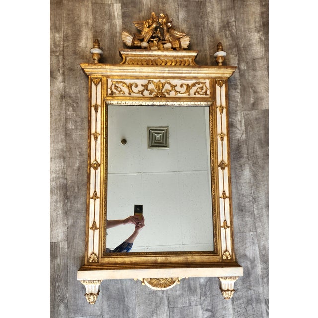 This stunning vintage Neoclassical Louis XVI style trumeau wall mirror by the renowned LaBarge Mirror Company will elevate...