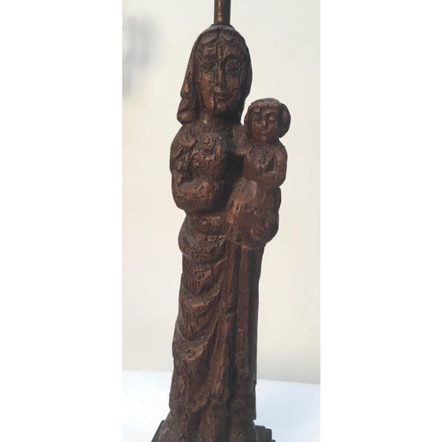 Interesting 1960s vintage plaster lamp in the shape of Vintage wood carving of Madonna and child .