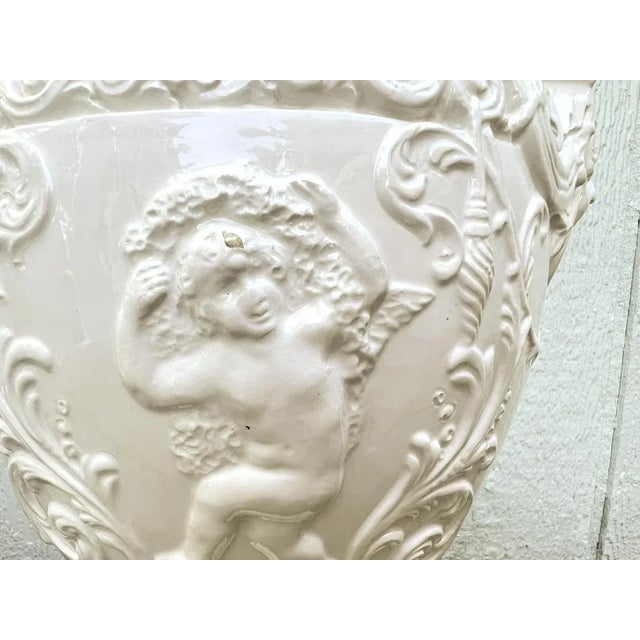 Late 20th Century Mario Buatta for Frederick Cooper Neoclassical White Embossed Urn Lamp With Cherubs and Faces For Sale - Image 12 of 12