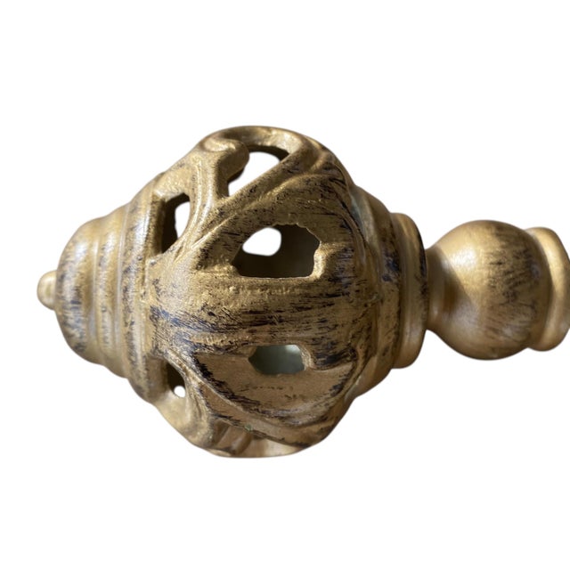 Elegant set of six vintage brass curtain tiebacks featuring finely detailed pierced pineapple finials. Executed in solid...