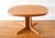 This is a Mid Century Scandinavian style teak coffee table by Nordic Furniture. It has a beautiful wood grain with parquet...
