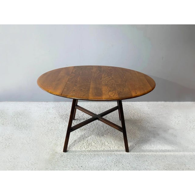Designed by Lucian R Ercolani, the Ercol Old Colonial 377 table is an earlier and rarer design than more recent Ercol...