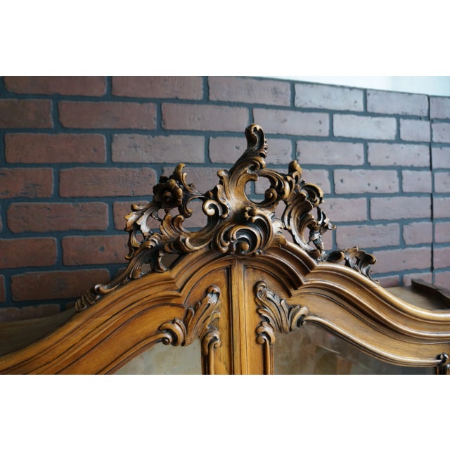 Exceptional in every way! Imported from Belgium this French display cabinet with secretary desk is as enchanting as it is...