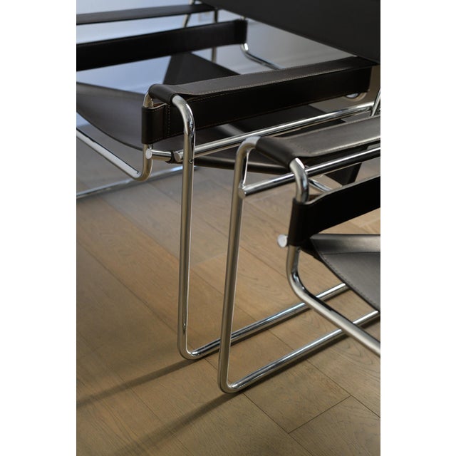 Pair of 1960s Marcel Breuer Wassily chairs in dark brown leather. We believe these to be well kept Gavina examples but...