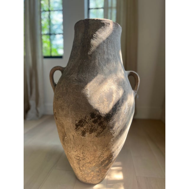 This striking 34-inch antique Hatay pot is a true statement piece for any home or garden. Handcrafted in the Hatay region...