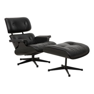 Set of Lounge Chair with Ottoman in Leather by Charles & Ray Eames for Vitra For Sale