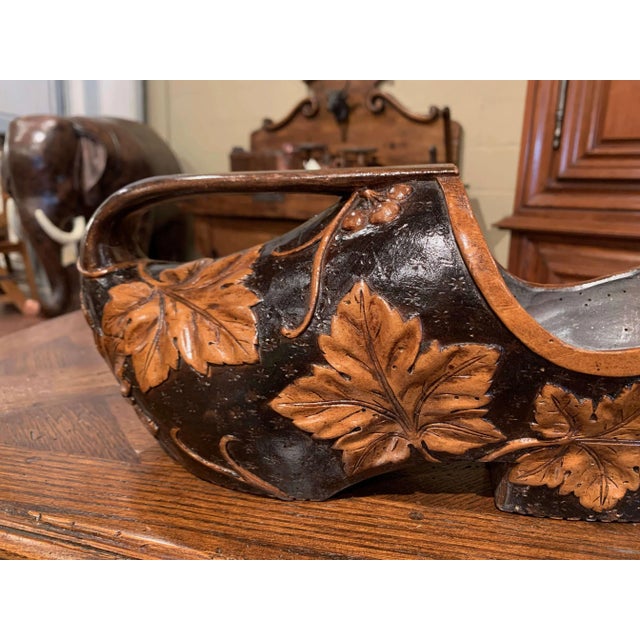 Serve in style with this sculptural French wine bottle holder, hand carved circa 1920 in the whimsical form of a...