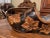 Serve in style with this sculptural French wine bottle holder, hand carved circa 1920 in the whimsical form of a...
