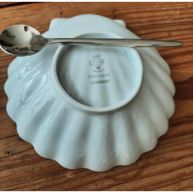 I have a beautiful set of four Scallop Shell Dishes by Chamart, made in France. These pieces were produced by Limoges...