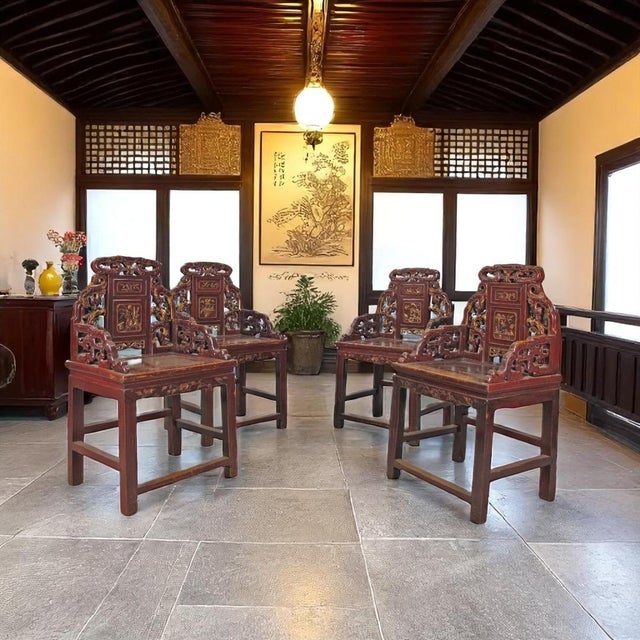 This set of 4 stunning antique Chinese grand master (Taishi) armchair features intricate carvings that showcase the skill...