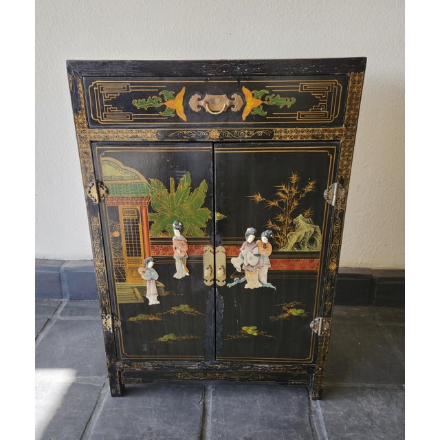 Midcentury Chinese two-door cabinet with hardstone possibly jade and mother-of-pearl inlay. Elegant relief geisha garden...