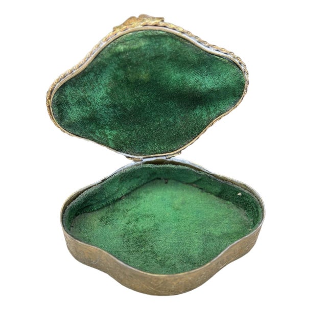 A beautifully crafted antique French-style porcelain trinket box, featuring an exquisite portrait of Queen Louise of...