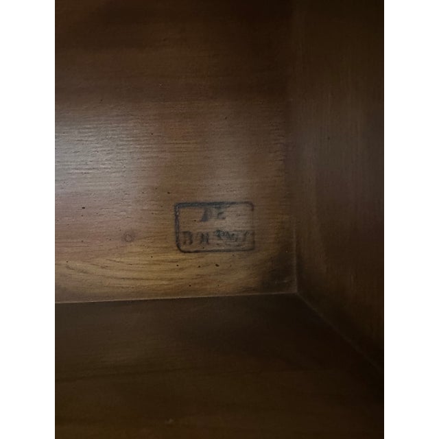 Produced in France for the American market, this De Bournais console table is a faithful reproduction of an older Louis...