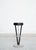 The set consists of four stools. Condition: Metal frame, seats upholstered in black leather. Good used condition with age-...