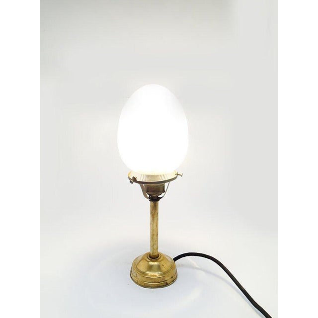 The night lamp comes from Germany from 1900-1910. It was made in the Art Nouveau style. The lampshade is made of glass in...