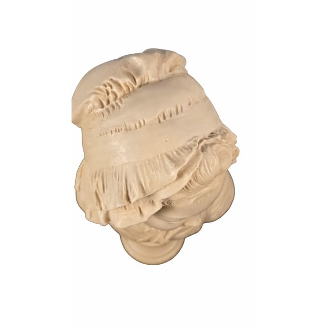 Graceful and timeless, this striking vintage Italian bust depicts a young French peasant girl with a softly downcast gaze,...