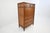 A refined Kindel Grand Rapids cherry chest of drawers, crafted in richly figured, warm-toned cherry wood with elegant...