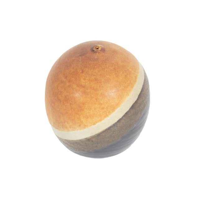 A studio pottery weed pot vase. Signed to the underside, this pot has an ovoid shape with reddish brown, off-white, dark...