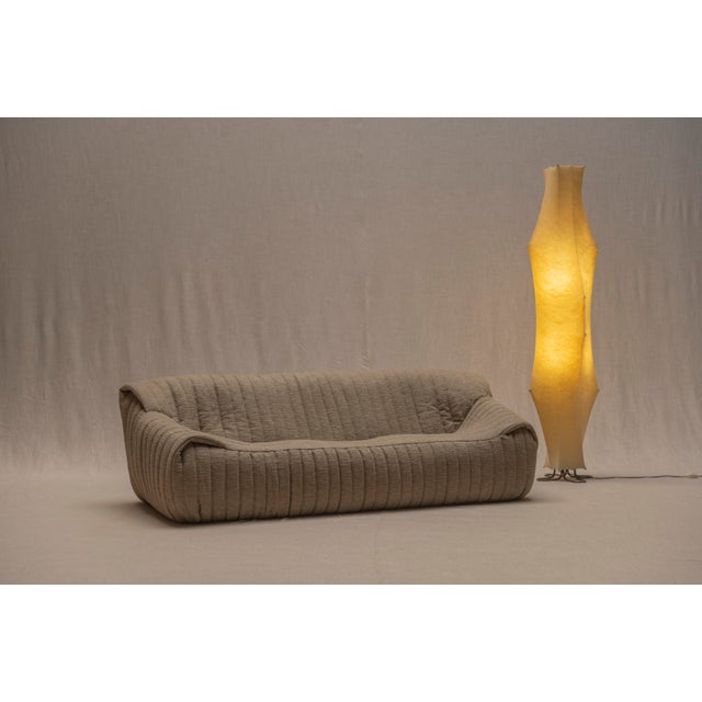 Iconic ‘Sandra’ three seat sofa designed by Annie Hieronimus for Cinna in the 1970s. This sculptural and enveloping design...