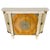 A vintage Neoclassical style console cabinet / commode featuring a dramatic serpentine silhouette with recessed side...